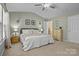 Spacious primary bedroom with carpet and ample closet space at 18016 Bluff Inlet Rd, Cornelius, NC 28031