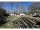 Spacious backyard featuring storage sheds and mature trees providing plenty of shade at 1961 Franklin St, Rock Hill, SC 29732