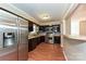 Eat-in kitchen featuring stainless steel appliances, sleek black cabinetry, and unique backsplash at 1961 Franklin St, Rock Hill, SC 29732