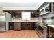 Kitchen with stainless steel appliances and colorful tile backsplash at 1961 Franklin St, Rock Hill, SC 29732