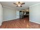 Spacious open-plan living and kitchen area with hardwood floors and stainless steel appliances at 1961 Franklin St, Rock Hill, SC 29732