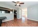Open living room with hardwood floors leading to a modern kitchen and bright dining area at 1961 Franklin St, Rock Hill, SC 29732