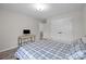Bedroom featuring wood floors, desk and double door closet at 201 Bennett Trail Dr, Mount Holly, NC 28120