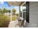 Inviting front porch featuring comfortable seating area to enjoy the outdoors at 201 Bennett Trail Dr, Mount Holly, NC 28120