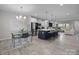 Bright open concept with a dining table, kitchen island, and large open space at 201 Bennett Trail Dr, Mount Holly, NC 28120