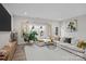 Bright living room with a large sectional sofa, stylish coffee table, and an open layout at 201 Bennett Trail Dr, Mount Holly, NC 28120