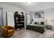 Comfortable main bedroom featuring stylish decor, ample natural light, and modern furniture at 201 Bennett Trail Dr, Mount Holly, NC 28120