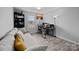Bright office with a comfortable sofa, desk, and window, perfect for a productive work environment at home at 201 Bennett Trail Dr, Mount Holly, NC 28120