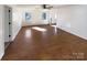 Living room featuring hardwood floors, neutral walls, with bright natural light at 205 Mauney St, Mount Holly, NC 28120