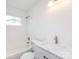 Bathroom with a clean white tile shower-tub, stylish faucet, and a bright vanity at 2286 Kilborne Dr, Charlotte, NC 28205