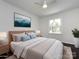 Bright bedroom featuring a ceiling fan, dark wood floors, and a large window at 2286 Kilborne Dr, Charlotte, NC 28205