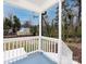 Covered porch with white railings and blue flooring at 2286 Kilborne Dr, Charlotte, NC 28205