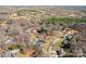 Aerial view showcasing property's in-ground pool, adjacent to surrounding neighborhood, nestled amidst lush foliage and surroundings at 2659 Surrey Dr, Lincolnton, NC 28092