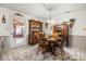 Classic dining room with vintage china cabinet and wooden table at 2659 Surrey Dr, Lincolnton, NC 28092