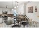 Bright kitchen with white cabinets, dark granite counters, stainless appliances, and a cozy breakfast bar at 2659 Surrey Dr, Lincolnton, NC 28092