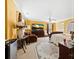 Bedroom with a large television, fan, sitting area and carpet at 2988 Clover Nw Rd, Concord, NC 28027