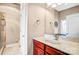 Bathroom featuring granite countertops, custom cabinets, and a walk-in shower at 305 Chancelot Ln, Fort Mill, SC 29708