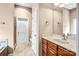 Bathroom vanity with marble countertop, tile floors and separate shower at 305 Chancelot Ln, Fort Mill, SC 29708
