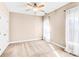 Minimalist bedroom with plush carpet, a ceiling fan and sheer curtains at 305 Chancelot Ln, Fort Mill, SC 29708