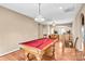 Upstairs bonus room featuring hardwood floors and a pool table at 305 Chancelot Ln, Fort Mill, SC 29708