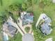 Aerial view of a beautifully landscaped property with circular driveway at 3759 Sand Wedge Dr, Gastonia, NC 28056