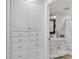 Bathroom with custom cabinets, sink and a view into the toilet and shower area at 3759 Sand Wedge Dr, Gastonia, NC 28056