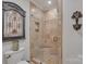Bathroom features a glass shower with a seat and decorative tile work at 3759 Sand Wedge Dr, Gastonia, NC 28056