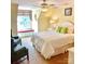 Bright bedroom features a ceiling fan, neutral walls, and a window seat at 3759 Sand Wedge Dr, Gastonia, NC 28056