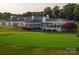 Exterior view of clubhouse with golf course at 3759 Sand Wedge Dr, Gastonia, NC 28056