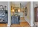 Elegant foyer with hardwood floors, decorative accents, and a glimpse into the home's layout at 3759 Sand Wedge Dr, Gastonia, NC 28056