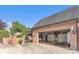 Garage and patio featuring brick exterior, open garage door and lots of outdoor space at 3759 Sand Wedge Dr, Gastonia, NC 28056