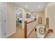 Upstairs hallway leading to bedrooms and staircase at 3759 Sand Wedge Dr, Gastonia, NC 28056