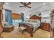 Spacious primary bedroom features a large bed, sitting area, and decorative accents at 3759 Sand Wedge Dr, Gastonia, NC 28056