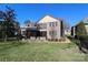 Beautiful backyard view showcasing the home's exterior and serene setting at 4124 Sherbrooke Dr, Charlotte, NC 28210