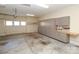 Garage with cabinets, a work bench and pegboard for storage at 4124 Sherbrooke Dr, Charlotte, NC 28210