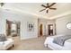 Spacious main bedroom leads to the walk-in closet and ensuite bathroom with neutral colors and lots of light at 4124 Sherbrooke Dr, Charlotte, NC 28210