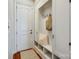 Organized mudroom with built-in storage, hooks, and a comfortable bench at 4124 Sherbrooke Dr, Charlotte, NC 28210