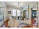 Cozy sitting area with hardwood floors, stylish armchairs, and views into adjacent rooms at 4124 Sherbrooke Dr, Charlotte, NC 28210