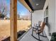 Inviting front porch with two rocking chairs perfect for enjoying the outdoors at 619 Berkshire Dr, Statesville, NC 28677