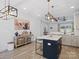 Bright kitchen features pendant lights, island with seating, and an open floor plan at 619 Berkshire Dr, Statesville, NC 28677