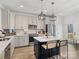 Stylish kitchen featuring stainless steel appliances, a center island with seating, and pendant lighting at 619 Berkshire Dr, Statesville, NC 28677