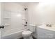 Bathroom features a shower-tub, white vanity, and updated fixtures at 735 Green St, Rock Hill, SC 29730