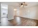 Open-concept living room with hardwood floors, white trim, and an inviting entrance at 735 Green St, Rock Hill, SC 29730