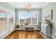 Charming dining nook features a bright window, french doors, and space for a breakfast table at 7362 Vanguard Ct, Stanley, NC 28164