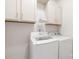 The well-equipped laundry room has a newer washing machine and dryer and built in storage cabinets at 7362 Vanguard Ct, Stanley, NC 28164