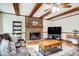 Inviting living room featuring a brick fireplace and hardwood floors at 7921 Altacrest Dr, Concord, NC 28027