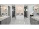 A luxurious bathroom featuring double vanities, a soaking tub, and walk-in showers on either side at Lot 17 Ridgeview Ln, Iron Station, NC 28080
