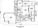 Detailed main floor plan showcasing an open layout with kitchen, dining, great room, and three-car garage at Lot 17 Ridgeview Ln, Iron Station, NC 28080
