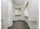 Organized walk-in closet with shelving and ample storage space at 10349 Linksland Dr, Huntersville, NC 28078