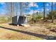 Backyard view of a shed and path to the main house at 1133 Bloom Wood Ln, Matthews, NC 28105